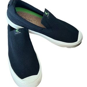 Cariuma Men’s like New black slip ons.